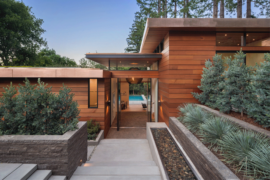 New construction modern home with black Andersen windows.