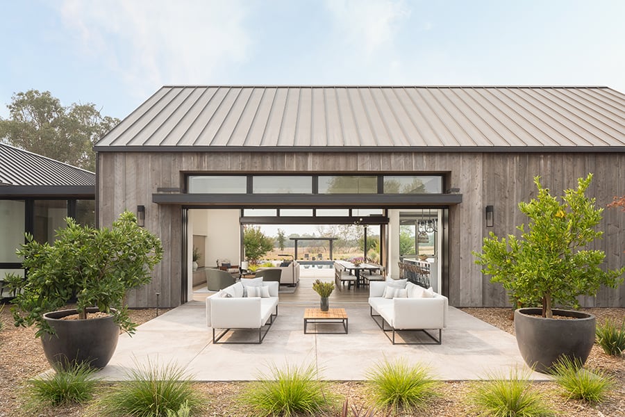 indoor outdoor space that has two openings to the outdoors